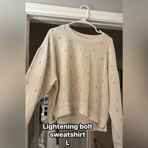 Cream Sweatshirt with Lightning Bolt Pattern